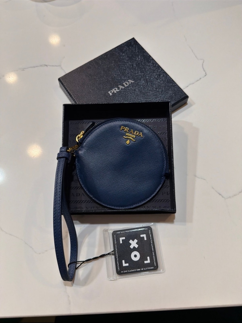 Authentic Prada Navy Saffiano Leather Coin Pouch with Gold Hardware